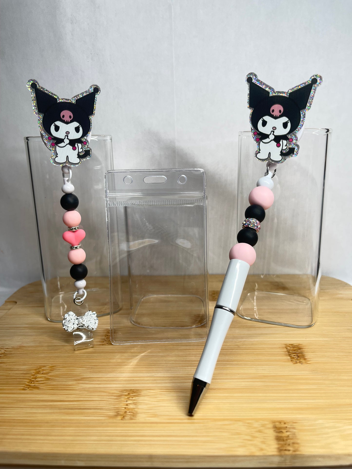 Retractable badge and pen sets