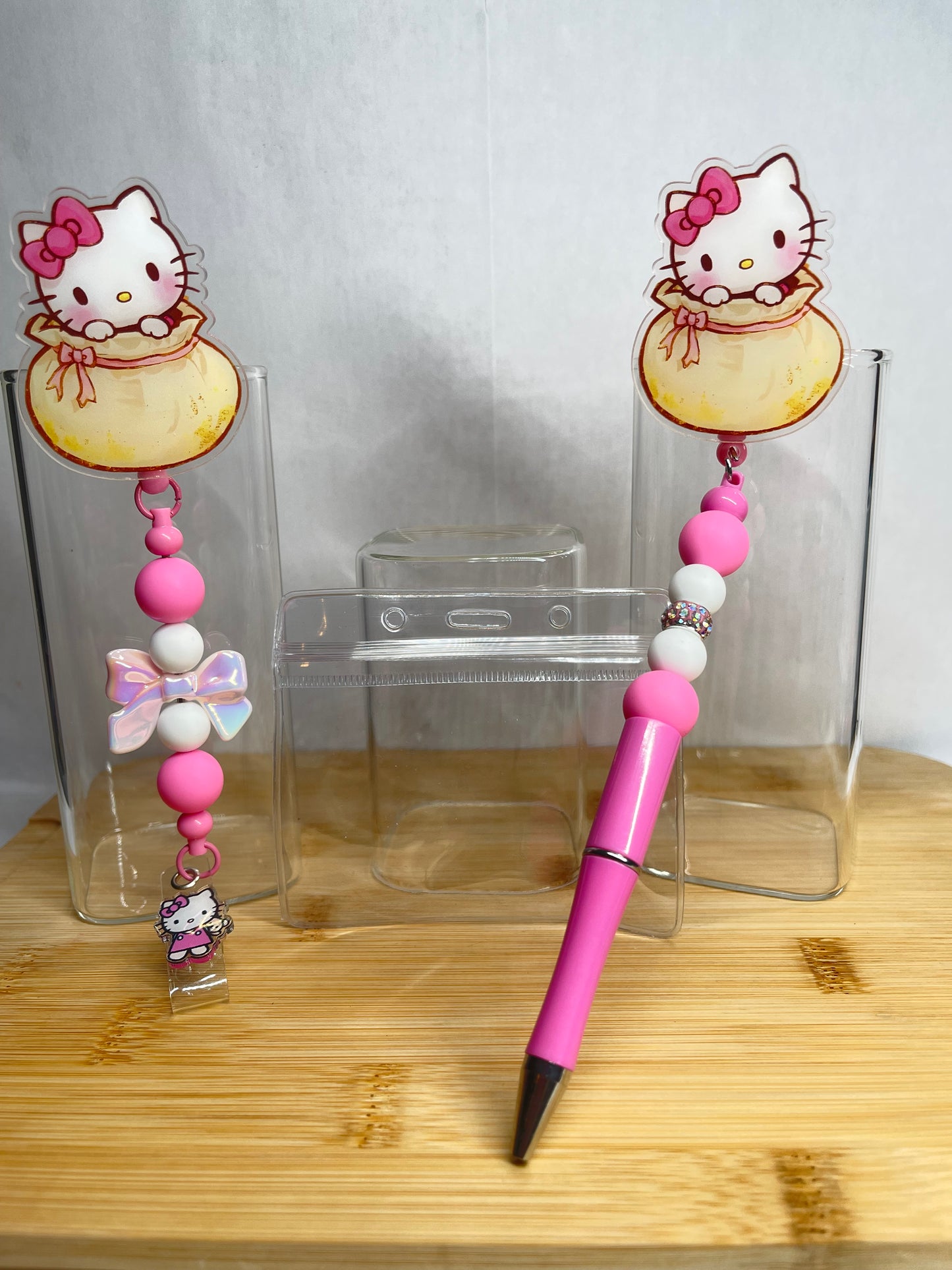 Retractable badge and pen sets