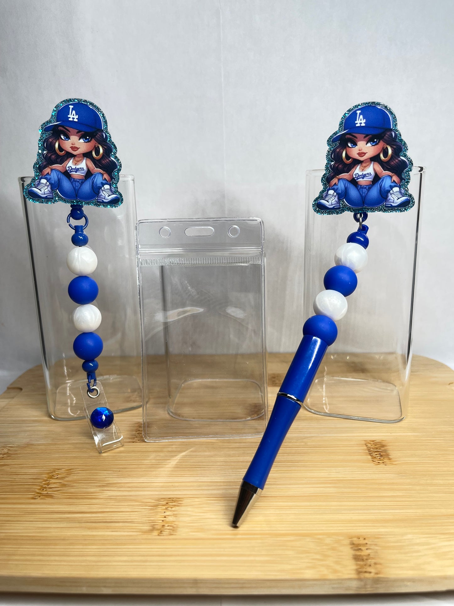 Retractable badge and pen sets